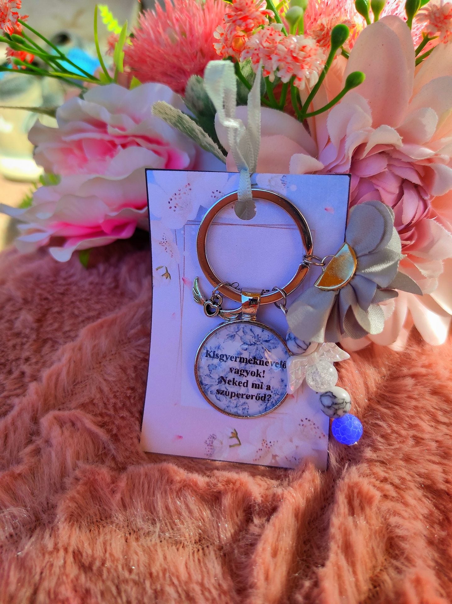 Kisgyermeknevelő kulcstartó kék